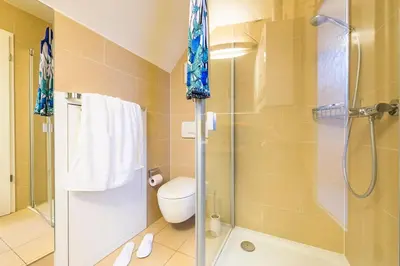 Ein Badezimmer in der Unterkunft Birkenstr.6 i WHG 10