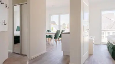 Ein Sitzbereich in der Unterkunft Apartmenthaus Wittsande - 01