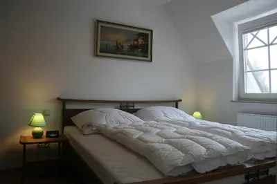 Ein Bett oder Betten in einem Zimmer der Unterkunft Birkenstrasse 5 F Wohnung 7 
