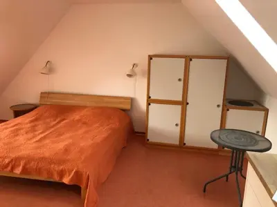Ein Bett oder Betten in einem Zimmer der Unterkunft Birkenstrasse 6 I Wohnung 11