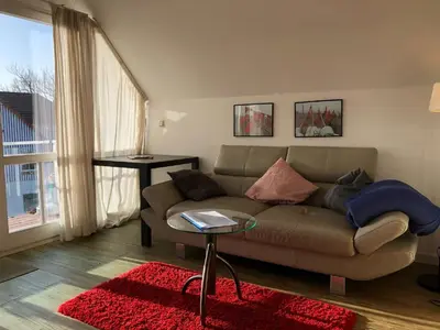Ein Sitzbereich in der Unterkunft Birkenstrasse.6 i Wohnung 12