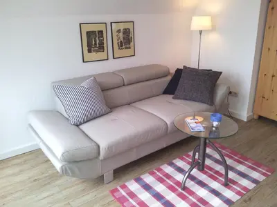 Ein Sitzbereich in der Unterkunft Birkenstrasse.6 i Wohnung 12
