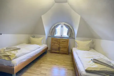 Ein Bett oder Betten in einem Zimmer der Unterkunft Haus Seegurke