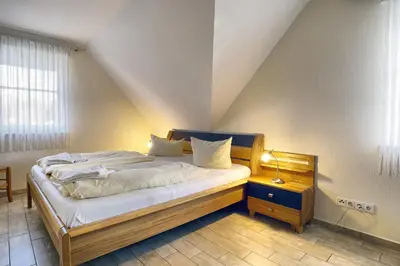 Ein Bett oder Betten in einem Zimmer der Unterkunft Haus Seegurke