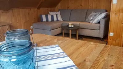 Ein Sitzbereich in der Unterkunft Birkmaase 3 Muschelblau OG