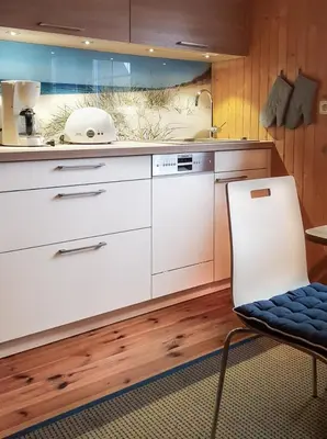 Küche/Küchenzeile in der Unterkunft Birkmaase 3 Muschelblau OG