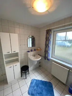 Ein Badezimmer in der Unterkunft Darsser Weg 36
