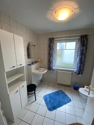 Ein Badezimmer in der Unterkunft Darsser Weg 36