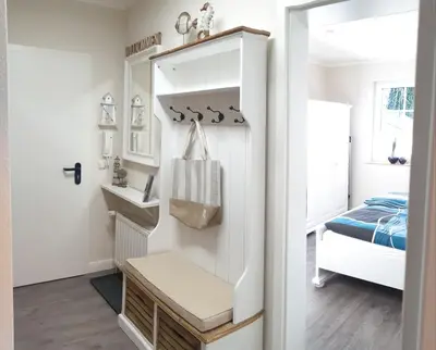 Ein Bett oder Betten in einem Zimmer der Unterkunft Haus Seeteufel