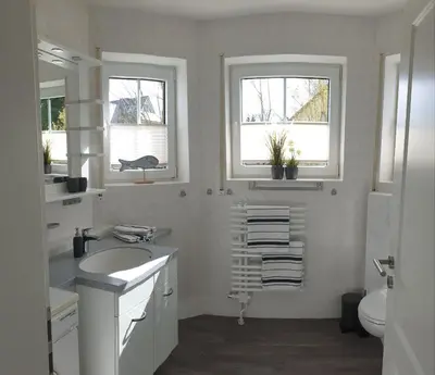 Ein Badezimmer in der Unterkunft Haus Seeteufel