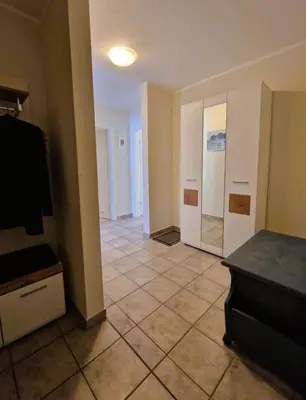 Ein Bett oder Betten in einem Zimmer der Unterkunft Darsser Weg 38a