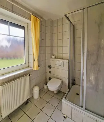 Ein Badezimmer in der Unterkunft Darsser Weg 38