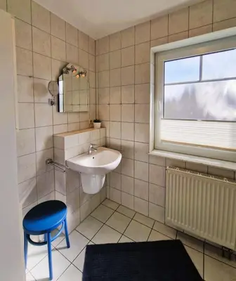Ein Badezimmer in der Unterkunft Darsser Weg 38