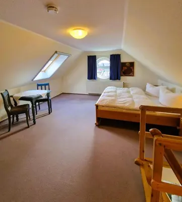 Ein Bett oder Betten in einem Zimmer der Unterkunft Darsser Weg 38