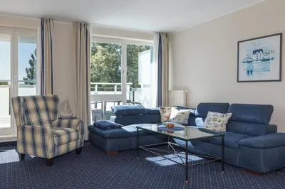 Ein Sitzbereich in der Unterkunft Apartment am Kurstrand