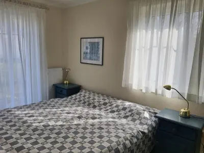 Ein Bett oder Betten in einem Zimmer der Unterkunft Darsser Weg 32