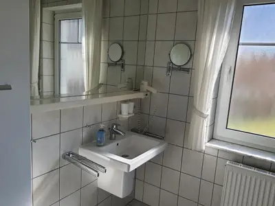 Ein Badezimmer in der Unterkunft Darsser Weg 32