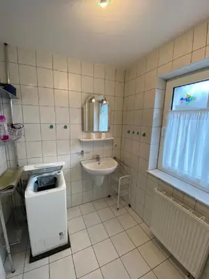 Ein Badezimmer in der Unterkunft Darsser Weg 32