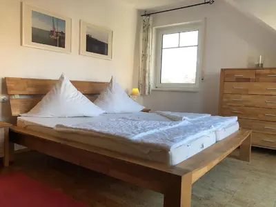 Ein Bett oder Betten in einem Zimmer der Unterkunft Darsser Weg 34 a