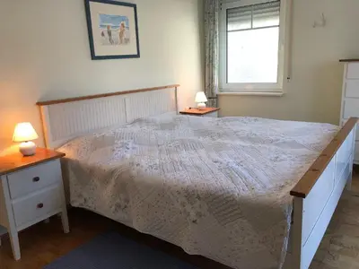 Ein Bett oder Betten in einem Zimmer der Unterkunft Darsser Weg 