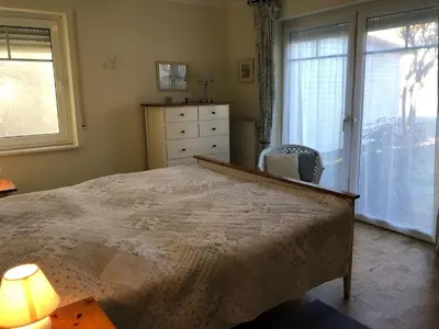 Ein Bett oder Betten in einem Zimmer der Unterkunft Darsser Weg 