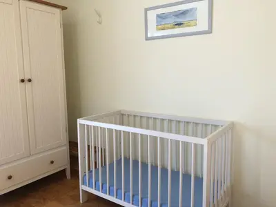 Ein Bett oder Betten in einem Zimmer der Unterkunft Darsser Weg 