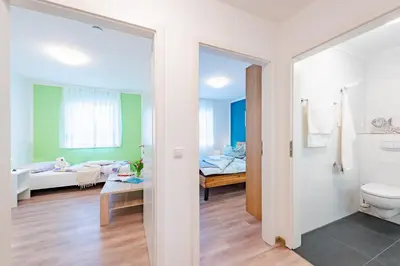Ein Bett oder Betten in einem Zimmer der Unterkunft Darßer Weg 31a