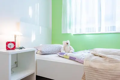 Ein Bett oder Betten in einem Zimmer der Unterkunft Darßer Weg 31a