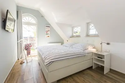 Ein Bett oder Betten in einem Zimmer der Unterkunft Friedensstr.20 A Wohnung 5