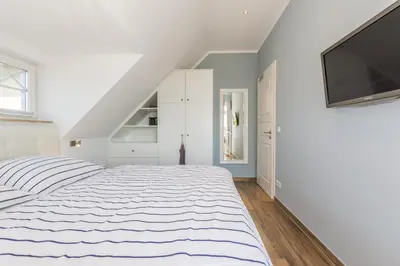 Ein Bett oder Betten in einem Zimmer der Unterkunft Friedensstr.20 A Wohnung 5