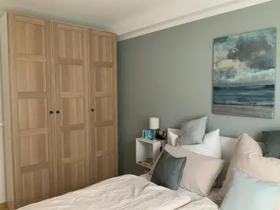 Ein Bett oder Betten in einem Zimmer der Unterkunft Friedensstraße 41 Wohnung 10