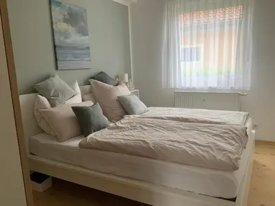 Ein Bett oder Betten in einem Zimmer der Unterkunft Friedensstraße 41 Wohnung 10