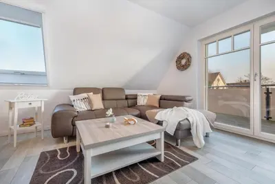 Ein Sitzbereich in der Unterkunft Villa Boddenluft