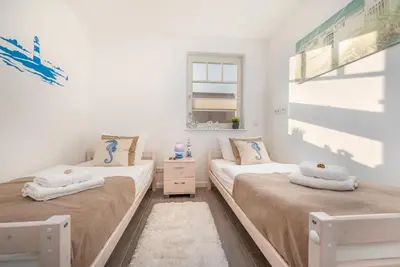 Ein Bett oder Betten in einem Zimmer der Unterkunft Villa Boddenluft