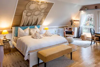 Ein Bett oder Betten in einem Zimmer der Unterkunft Suite - Traumfänger
