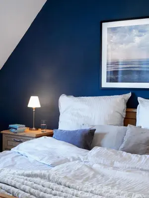 Ein Bett oder Betten in einem Zimmer der Unterkunft Friedenstr.43 Whg.6 Wellenläufer