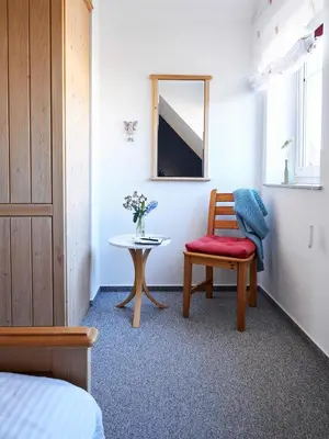 Ein Bett oder Betten in einem Zimmer der Unterkunft Friedenstr.43 Whg.6 Wellenläufer