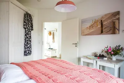Ein Bett oder Betten in einem Zimmer der Unterkunft Luxusferienhaus in Fuhlendorf mit Sauna