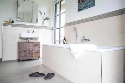 Ein Badezimmer in der Unterkunft Luxusferienhaus in Fuhlendorf mit Sauna
