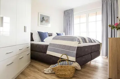 Ein Bett oder Betten in einem Zimmer der Unterkunft Ferienhaus in Fuhlendorf