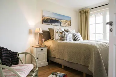 Ein Bett oder Betten in einem Zimmer der Unterkunft Haus in Bodstedt mit Sauna am Bodden