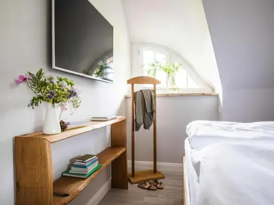 Ein Bett oder Betten in einem Zimmer der Unterkunft Luxurioeses Ferienhaus in Fuhlendorf