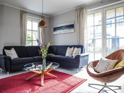 Ein Sitzbereich in der Unterkunft Luxurioeses Ferienhaus in Fuhlendorf