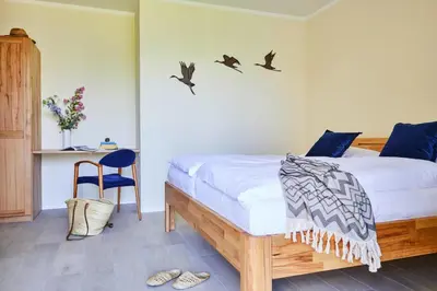 Ein Bett oder Betten in einem Zimmer der Unterkunft Premium-Ferienhaus in Fuhlendorf