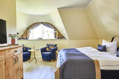 Ein Bett oder Betten in einem Zimmer der Unterkunft Premium-Ferienhaus in Fuhlendorf