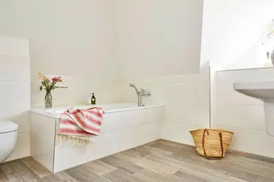 Ein Badezimmer in der Unterkunft Premium-Ferienhaus in Fuhlendorf