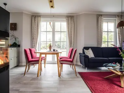 Ein Sitzbereich in der Unterkunft Ferienhaus in Fuhlendorf mit Sauna