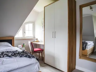 Ein Bett oder Betten in einem Zimmer der Unterkunft Ferienhaus in Fuhlendorf mit Sauna