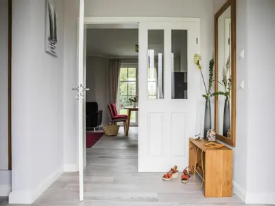 Ein Sitzbereich in der Unterkunft Ferienhaus in Fuhlendorf mit Sauna