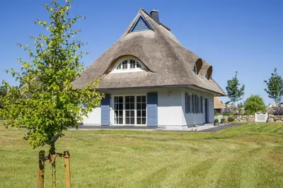 Ein Garten an der Unterkunft Ferienhaus in Fuhlendorf
